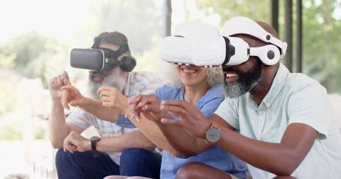 Senior citizens engaging in virtual reality gaming together