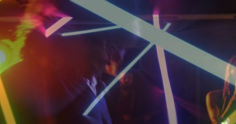 Neon nightclub silhouettes cutting led beams, singer holding microphone in haze