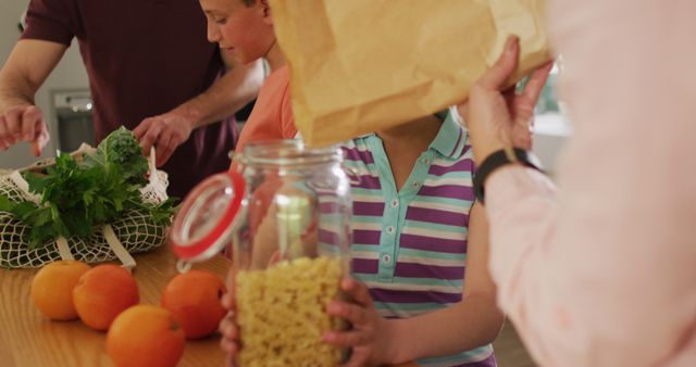 Family Preparing Groceries in Kitchen - Download Free Stock Images Pikwizard.com