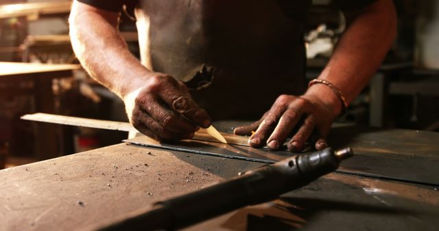 Metalworker Cutting Steel Sheet with Precision in Workshop - Download Free Stock Images Pikwizard.com