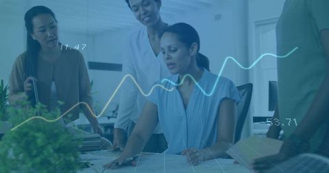 Diverse Team Engaging in Data Analysis at Modern Office