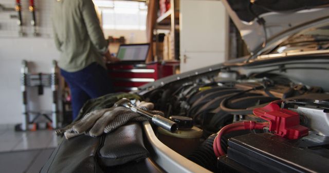 Mechanic Working on Car Engine in Workshop Scene - Download Free Stock Photos Pikwizard.com