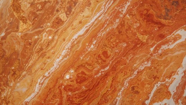 Abstract amber and gold swirling marble pattern