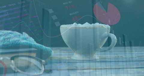 Frothy latte on painted wooden planks with glasses and teal knit, analytics graph overlay
