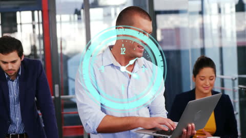 Business Executive Smiling While Using Laptop in Office Setting