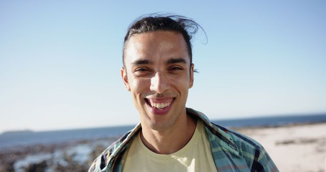 Happy Man Smiling at Beach on Sunny Day - Download Free Stock Images Pikwizard.com