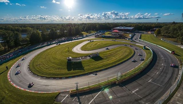 Aerial view of winding go-kart track in the forest
