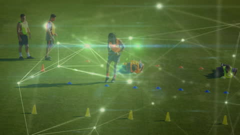 Soccer Players Training with Digital Network Overlay