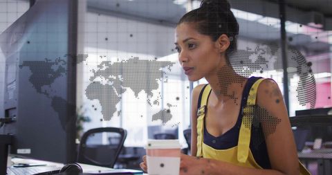 businesswoman analyzing digital world map in office environment - Download Free Stock Images Pikwizard.com