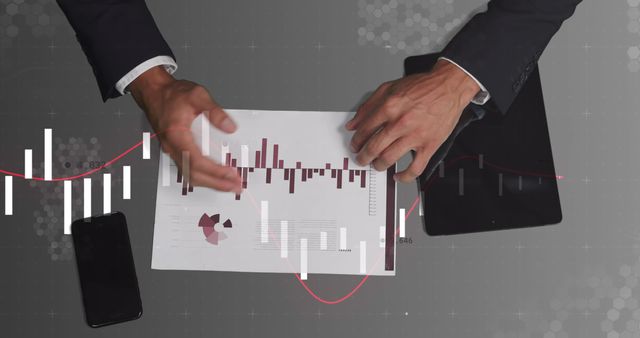 Image of diverse financial data and graphs over hands of caucasian businessman. Business, data processing and finance concept digitally generated image.