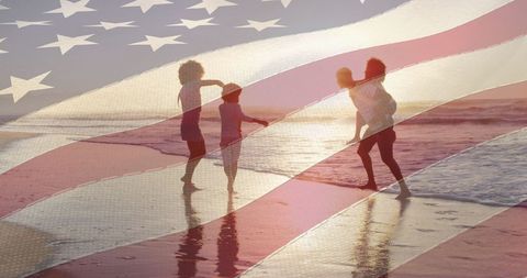 African American Family at Beach Overlaid with American Flag