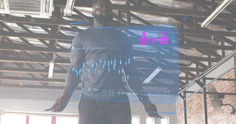 Jumping athlete skipping rope in industrial gym with augmented reality financial overlay
