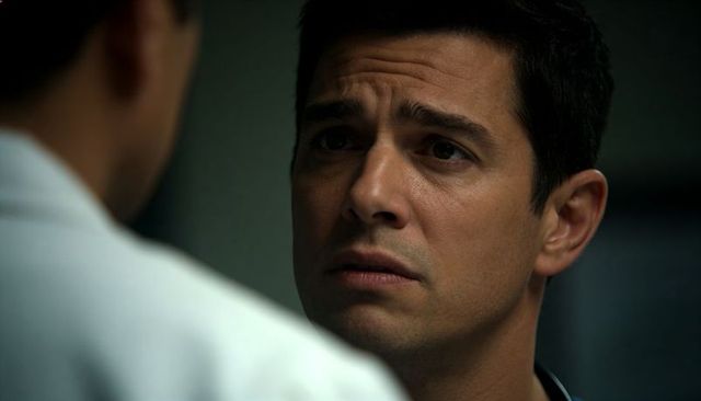 Worried patient receiving clinical consultation from doctor closeup portrait with stethoscope