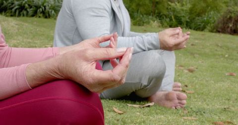 Couple Meditating Outdoors Promoting Mindfulness and Tranquility