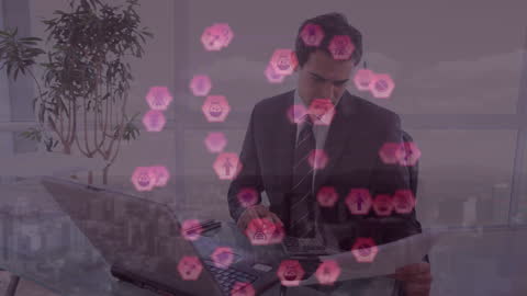 Businessman Analyzing Data on Laptop with Futuristic Interface