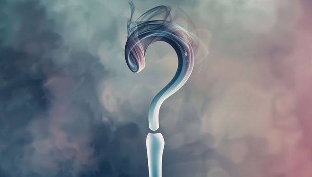 Abstract Question Mark with Colorful Smoke on Gradient Background