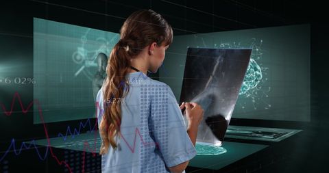 Female doctor analyzing medical data on holographic screens