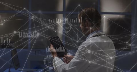 Doctor using tablet with digital network interface overlay - Download Free Stock Images Pikwizard.com
