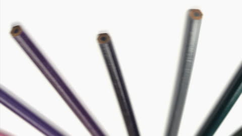 Color Pencils Array Against White Background