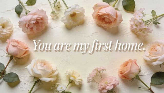 Peach and cream roses framing cursive you are my first home lettering on cream backdrop
