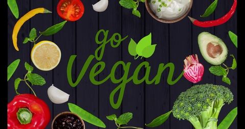 Go vegan flatlay promoting plant-based eating with avocado, broccoli, lemon, herbs