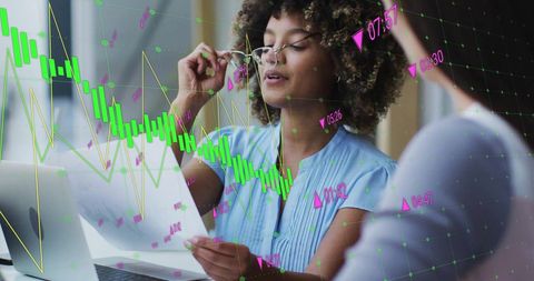 Diverse Colleagues Analyzing Digital Financial Data