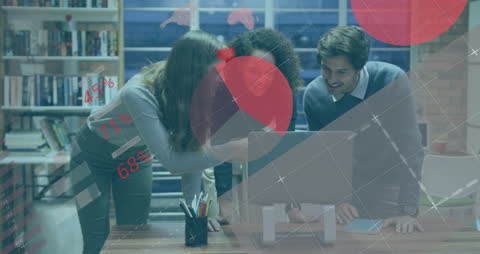 Team Analyzing Data Insights in Modern Office