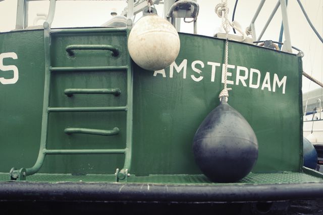 Close-up of Fishing Boat with Amsterdam Text - Download Free Stock Images Pikwizard.com