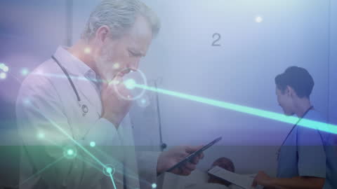 Caucasian Doctor Using Digital Tablet With Network Connections