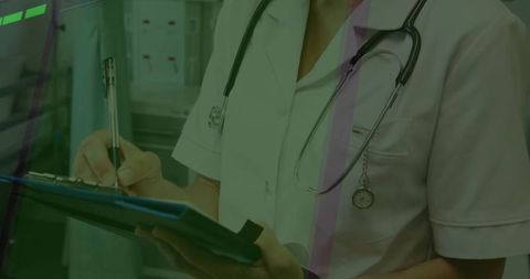 Healthcare Professional Filling Patient Records in Medical Facility