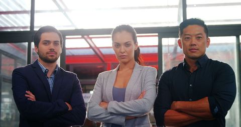 Confident Business Executives in Modern Office Environment