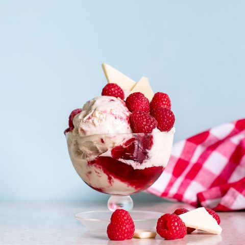 Delicious raspberry ice cream dessert in glass bowl