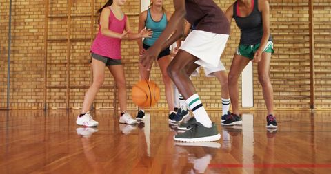 High School Students Playing Basketball Indoor Court