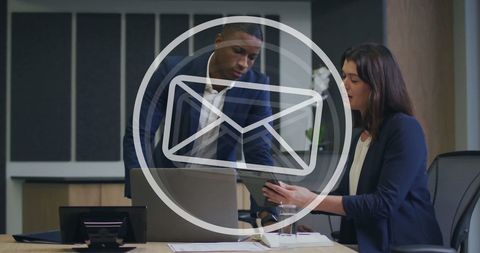 Colleagues Reviewing Documents in Office Conceptual Email Overlay