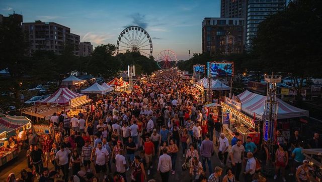 Twilight street festival crowds filling urban night market with colorful tents and ferris wheel
