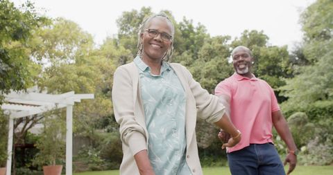 Senior African American Couple Enjoying Garden Walk