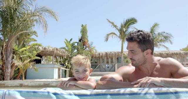 Father and Son Enjoying Tropical Pool Experience - Download Free Stock Images Pikwizard.com