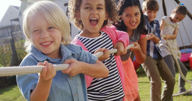 Children Playing Tug of War Outside Smiling - Download Free Stock Images Pikwizard.com