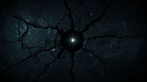 Bright Light Emanating from Cracked Floor in Dark Room