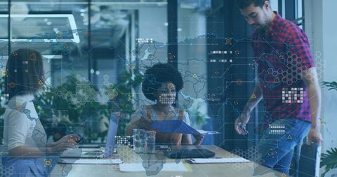 Global Tech Team Collaborating Around Table with Digital Map Overlay and Data Visualization