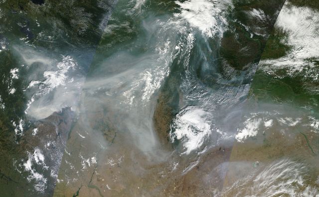 NASA image acquired August 4, 2010  Intense fires continued to rage in western Russia on August 4, 2010. Burning in dry peat bogs and forests, the fires produced a dense plume of smoke that reached across hundreds of kilometers. The Moderate Resolution Imaging Spectroradiometer (MODIS) captured this view of the fires and smoke in three consecutive overpasses on NASA’s Terra satellite. The smooth gray-brown smoke hangs over the Russian landscape, completely obscuring the ground in places. The top image provides a close view of the fires immediately southeast of Moscow, while the lower image shows the full extent of the smoke plume.  To read more about this image go to: <a href="http://earthobservatory.nasa.gov/IOTD/view.php?id=45046" rel="nofollow">earthobservatory.nasa.gov/IOTD/view.php?id=45046</a>  NASA image courtesy Jeff Schmaltz, MODIS Rapid Response Team at NASA GSFC.   <b><a href="http://www.nasa.gov/centers/goddard/home/index.html" rel="nofollow">NASA Goddard Space Flight Center</a></b>  is home to the nation's largest organization of combined scientists, engineers and technologists that build spacecraft, instruments and new technology to study the Earth, the sun, our solar system, and the universe.  <b>Follow us on <a href="http://twitter.com/NASA_GoddardPix" rel="nofollow">Twitter</a></b>  <b>Join us on <a href="http://www.facebook.com/pages/Greenbelt-MD/NASA-Goddard/395013845897?ref=tsd" rel="nofollow">Facebook</a><b></b></b>
