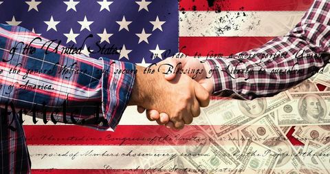 Handshake over american flag and constitution with currency