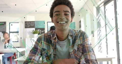 Smiling student using digital hud overlay in modern classroom for learning collaboration