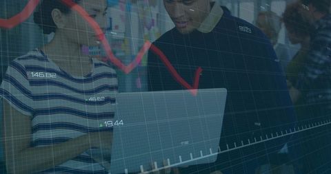 Team analyzing laptop with red falling graph overlay, collaboration and data dashboard