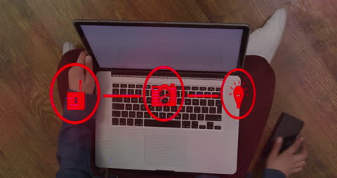 Woman Engaged in Digital Task on Laptop at Home