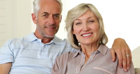 Senior Couple Relaxing on Couch at Home - Download Free Stock Images Pikwizard.com