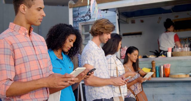 Diverse Group of Friends Using Smartphones in Line at Food Truck - Download Free Stock Images Pikwizard.com