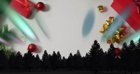 Festive season holiday gifts with forest silhouette