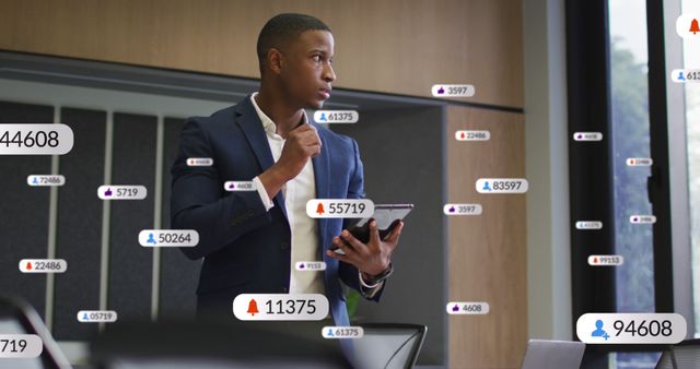 Businessman Analyzing Social Media Notifications on Tablet in Office - Download Free Stock Images Pikwizard.com