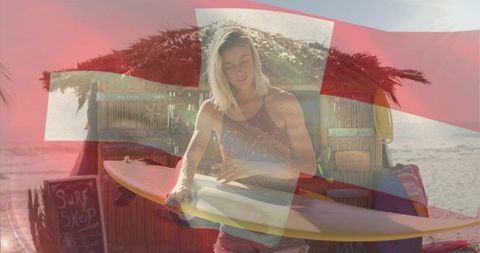 Woman waxing longboard at sunlit surf shack on beach with surf shop and red cross overlay